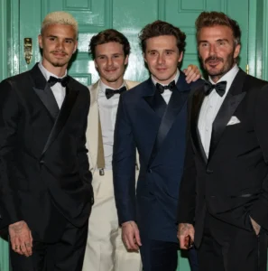 Dad David with his three sons, from left to right, Romeo, Cruz and Brooklyn